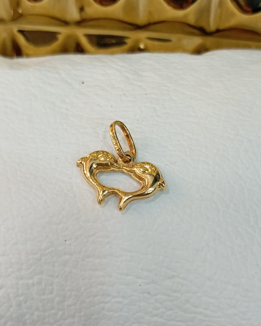 Dije corazón de delfines Oro 18k